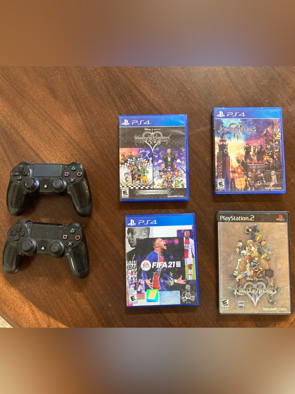 2 Black Wireless PS4 Controllers with Four PS Games